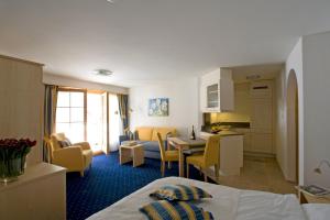 Kuchyň nebo kuchyňský kout v ubytování Hotel Allegra