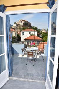 A balcony or terrace at Blue Sky Hotel - Petra - Lesvos - Greece