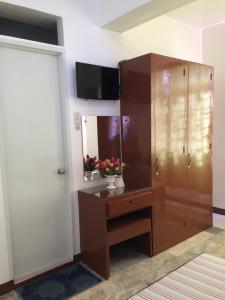TV a/nebo společenská místnost v ubytování Brielles Travellers Inn