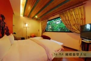 Letto o letti in una camera di Hsitou Man Tuo Xiang Homestay