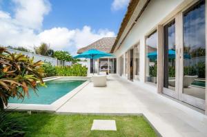 Swimmingpoolen hos eller tæt på Villa 3 chambres Angie