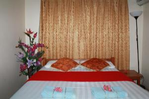 Postel nebo postele na pokoji v ubytování Pacific Paradise Motel