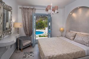 Postel nebo postele na pokoji v ubytování Felicity Luxury Villas + 37 fotografií