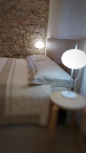 Postel nebo postele na pokoji v ubytování Casa Sant'Antoni
