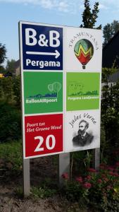 a sign for a park with a monkey on it at Bed & Breakfast Pergama in Haaren