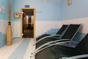 Posedenie v ubytovaní Apartament Pomarańczowy z basenem i sauną