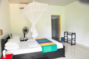 Postel nebo postele na pokoji v ubytování Sigiriya Amenity Home Stay