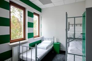 Posteľ alebo postele v izbe v ubytovaní Inbed Hostel