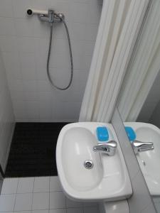 a bathroom with a sink and a shower at Residència Universitària Sant Joan in Reus