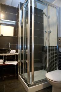 Kylpyhuone majoituspaikassa Arcohotel