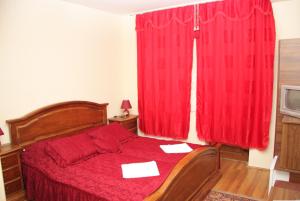Кровать или кровати в номере Vila Korona