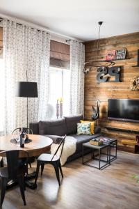 Televízia a/alebo spoločenská miestnosť v ubytovaní Nice Stay 2