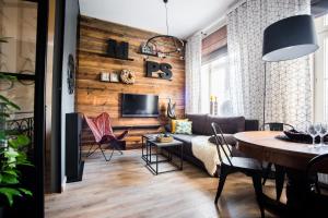 Televízia a/alebo spoločenská miestnosť v ubytovaní Nice Stay 2