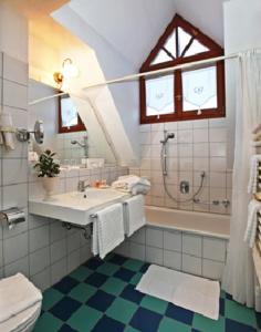A bathroom at Hotel Adler