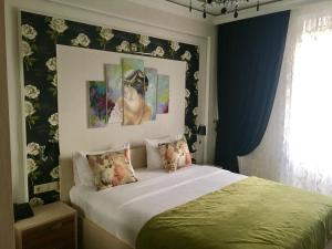 Posteľ alebo postele v izbe v ubytovaní Mini hotel Nabat Palace