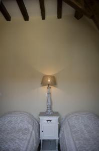 Postel nebo postele na pokoji v ubytování Auberge 's Gravenhof