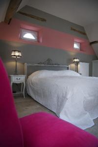 Postel nebo postele na pokoji v ubytování Auberge 's Gravenhof