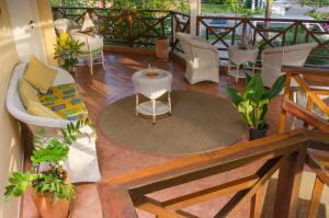 Uma área de estar em Pousada Villa Maritima
