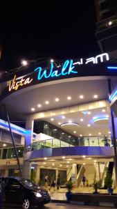 a vista villa building with a car parked in front at Vista Alam in Shah Alam