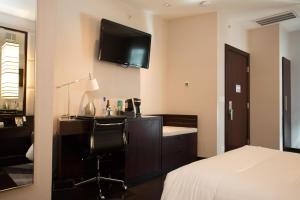 Lova arba lovos apgyvendinimo įstaigoje Ivy Boutique Hotel