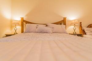 Postel nebo postele na pokoji v ubytování Dorney's B&B + 3 fotografie