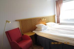 Postel nebo postele na pokoji v ubytování Hotell City