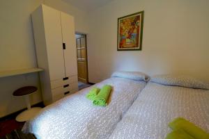 A bed or beds in a room at Casa Diana - WelcHome