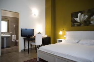 TV a/nebo společenská místnost v ubytování B&B Suite Paciotti