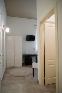 TV a/nebo společenská místnost v ubytování B&B Suite Paciotti