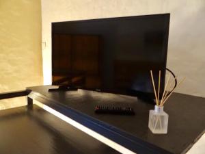 Μια τηλεόραση ή/και κέντρο ψυχαγωγίας στο Loft en Villa Crespo