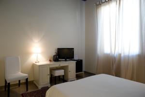 TV a/nebo společenská místnost v ubytování B&B Suite Paciotti