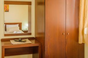 Postel nebo postele na pokoji v ubytování Olivera Apartments