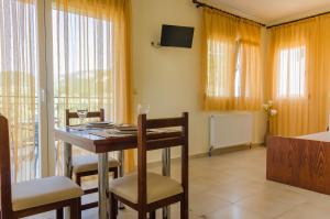 TV a/nebo společenská místnost v ubytování Olivera Apartments