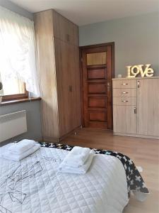 Llit o llits en una habitació de Apartament Morskie Oko