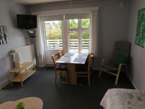 TV o dispositivi per l'intrattenimento presso Motel Garni Blåvand