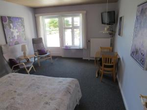 Letto o letti in una camera di Motel Garni Blåvand