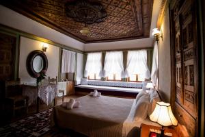 Кровать или кровати в номере Hotel Kalemi