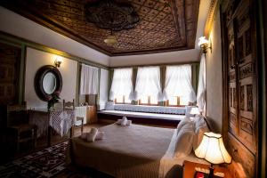 Postel nebo postele na pokoji v ubytování Hotel Kalemi