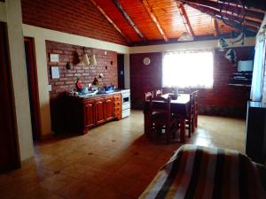 Una cocina o kitchenette en Cabañas Atrapasueños
