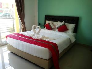 Postel nebo postele na pokoji v ubytování Greenfield Residence + 27 fotografií