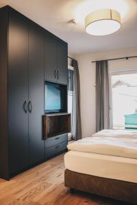 TWO TIMEZ - Boutique Hotel - with AC客房内的一张或多张床位