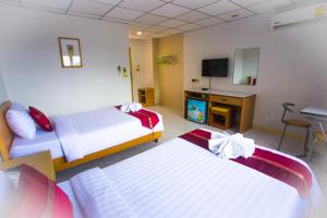 Cama o camas de una habitación en Central Place Hotel