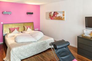 Ein Bett oder Betten in einem Zimmer der Unterkunft Alpenlove - Adult SPA Hotel