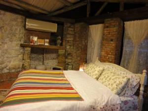 Postel nebo postele na pokoji v ubytování Jiufen Aromatherapy B&B