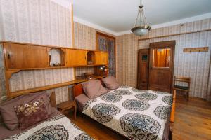 Postel nebo postele na pokoji v ubytování Bolnisi Prime House
