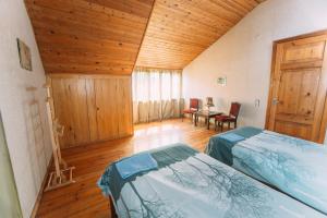 Postel nebo postele na pokoji v ubytování Bolnisi Prime House + 32 fotografií