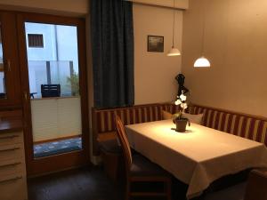 a dining room with a table and a window at Alpenspirit in Sölden