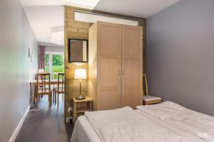 Postel nebo postele na pokoji v ubytování Highland Lodge