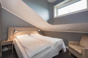 Postel nebo postele na pokoji v ubytování Highland Lodge