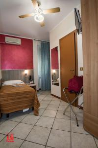 Postel nebo postele na pokoji v ubytování Hotel Bel Sit